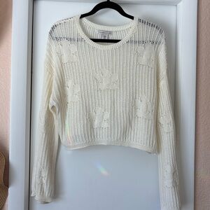 Cream knit sweater with flower details